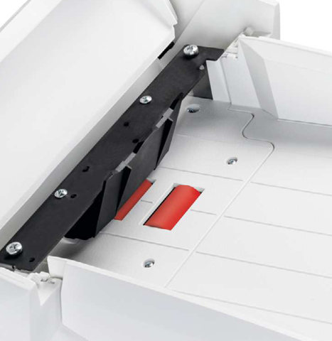 Magasin ouvert d'un destructeur de documents (broyeur de papier) HSM SECURIO AF, avec ses rouleaux rouges