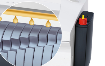 Huileur automatique HSM : l'huile goutte sur les cylindres de coupe du SECURIO B32